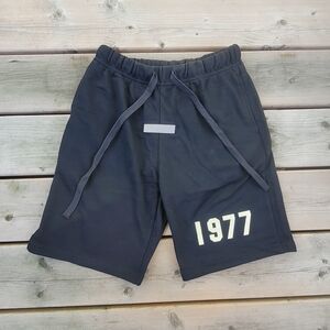 Essentials Black Athletic Shorts with 1977 Print